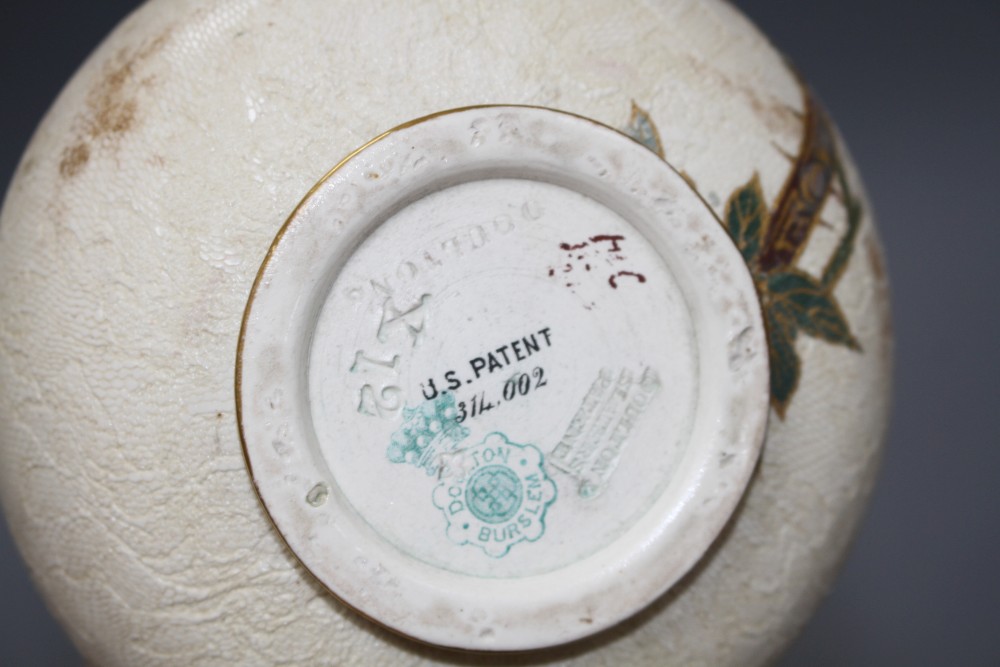 A pair of Doulton Burslem ewers, with floral decoration, US Patent stamp to base, height 17.5cm